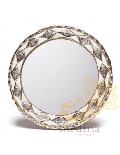 Miroir rond orné et décoré...
